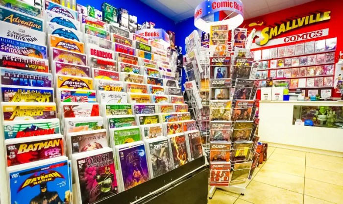 A store sells packages of comic books with a poster